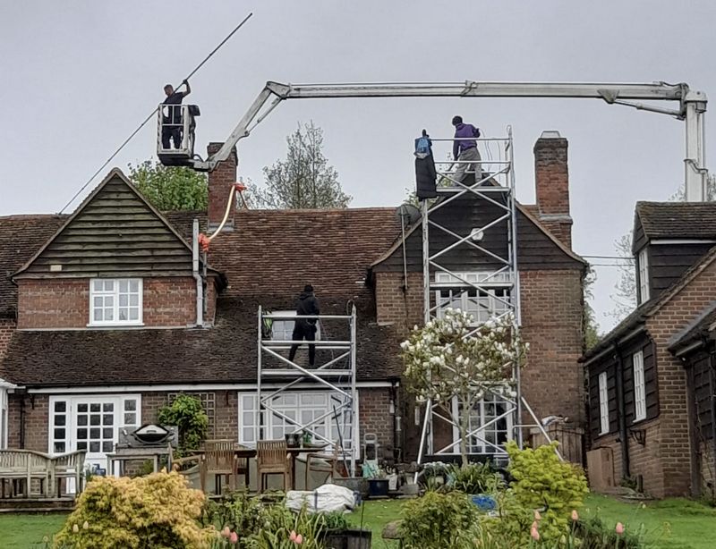 The Roof Moss Cleaners using cherry picker and scaffolding to clean roof safely and professionally in Staple Hill, Gloucestershire